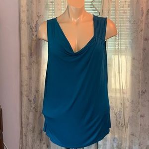 Sleeveless blue shirt